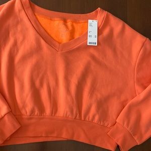 NWT urban outfitters orange  cropped sweatshirt in size Xl